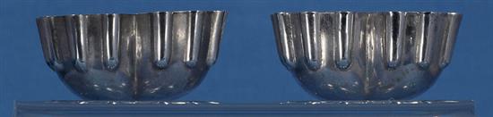 A pair of Victorian silver sweetmeat moulds,